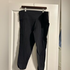 Athleta salutation stash tight